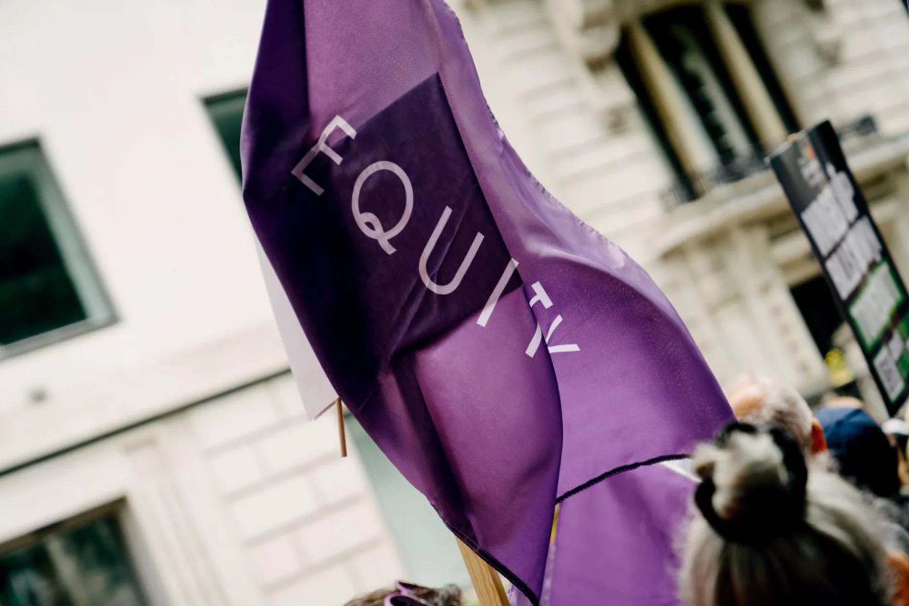 Purple Equity branded flag.