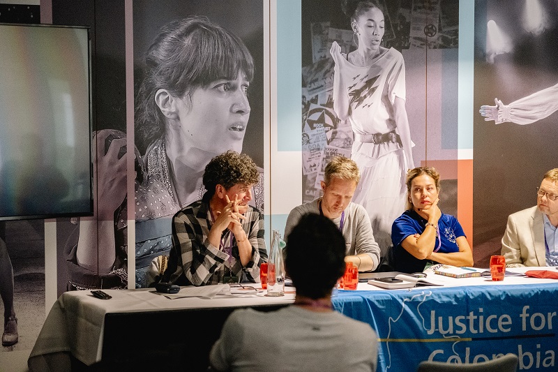 Four panellists sat at a table at a Justice for Colombia fringe event