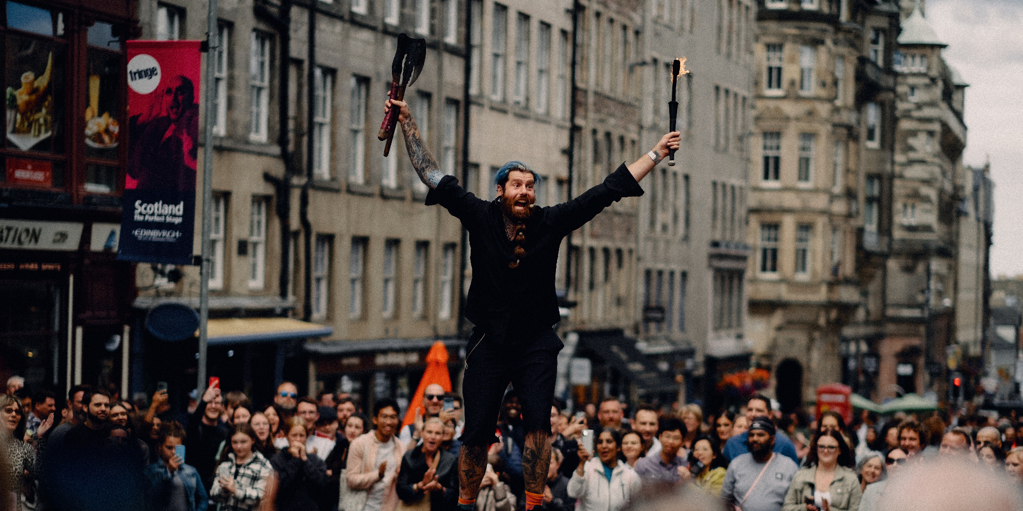 Fire juggler street performer Edinburgh Fringe