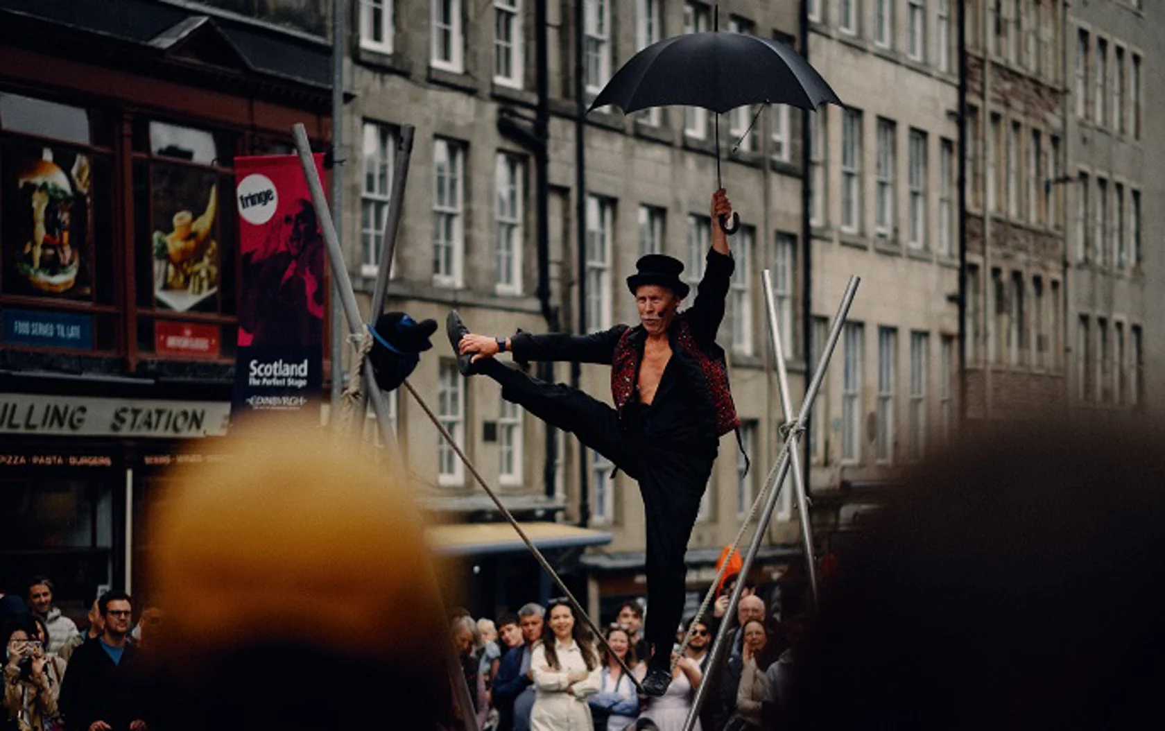 Edinburgh street performer on a tight rope